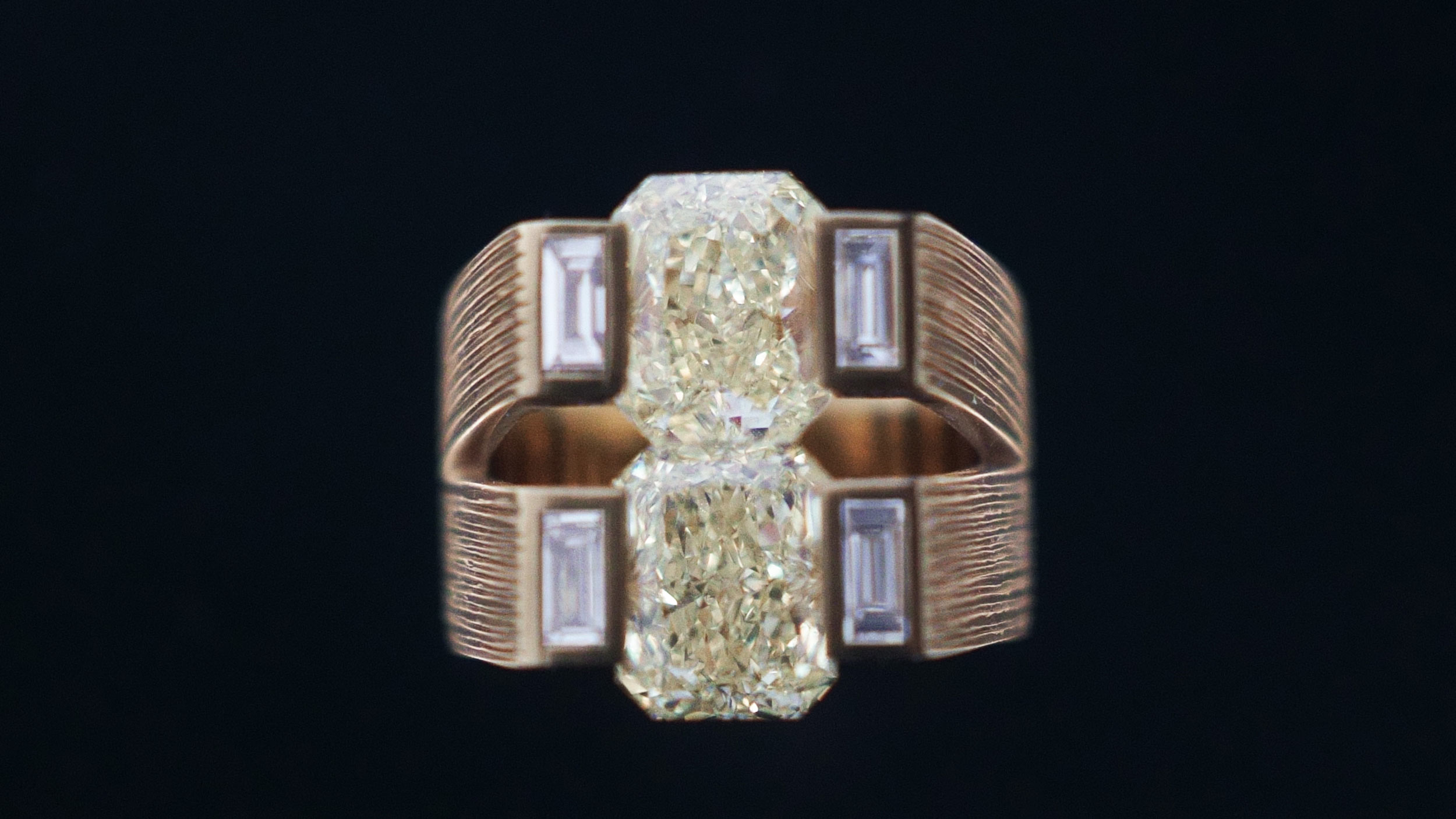 YELLOW HAND RIBBED GOLD W- BAGUETTE NATURAL WHITE DIAMONDS AND RADIANT CUT FANCY YELLOW NATURAL DIAMONDS